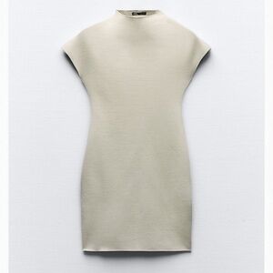 Zara New w Tags
Short fitted knit dress - medium - almond color